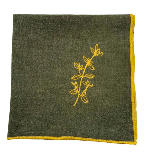 Serviette en lin lavé couleur vert safari, finition dorée_brodée d'une plante aromatique