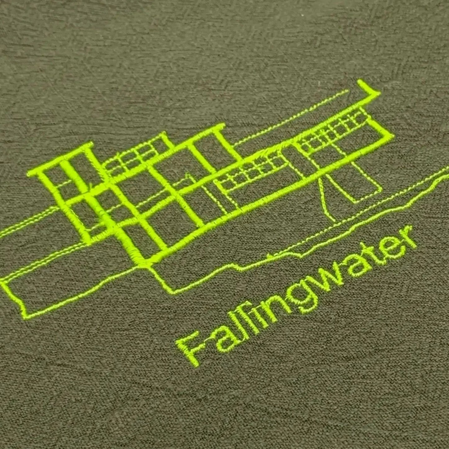 Serviette en lin lavé couleur vert safari brodée du plan du célèbre projet d'architecture Fallingwater_ détail broderie