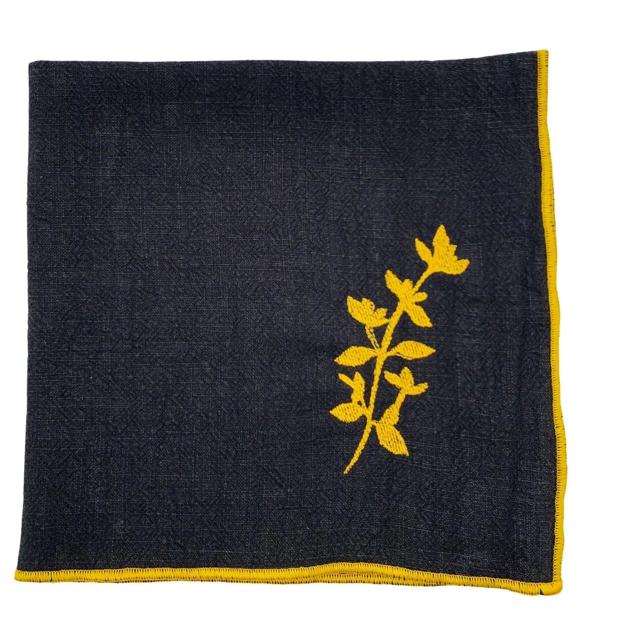 Serviette en lin lavé couleur noire finition dorée_brodée d'une plante aromatique