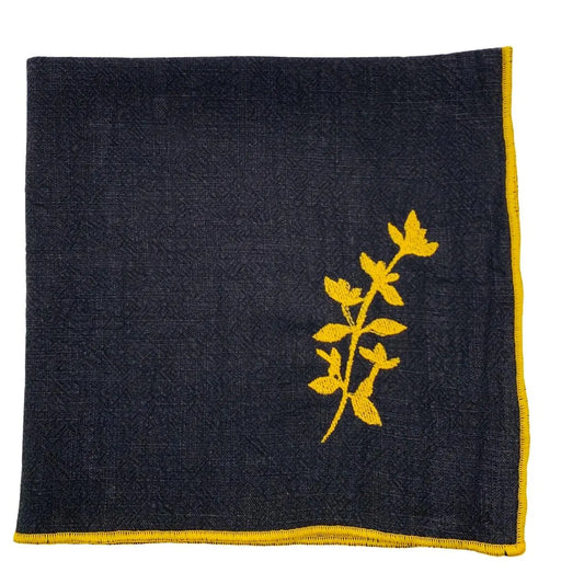 Serviette en lin lavé couleur noire finition dorée_brodée d'une plante aromatique